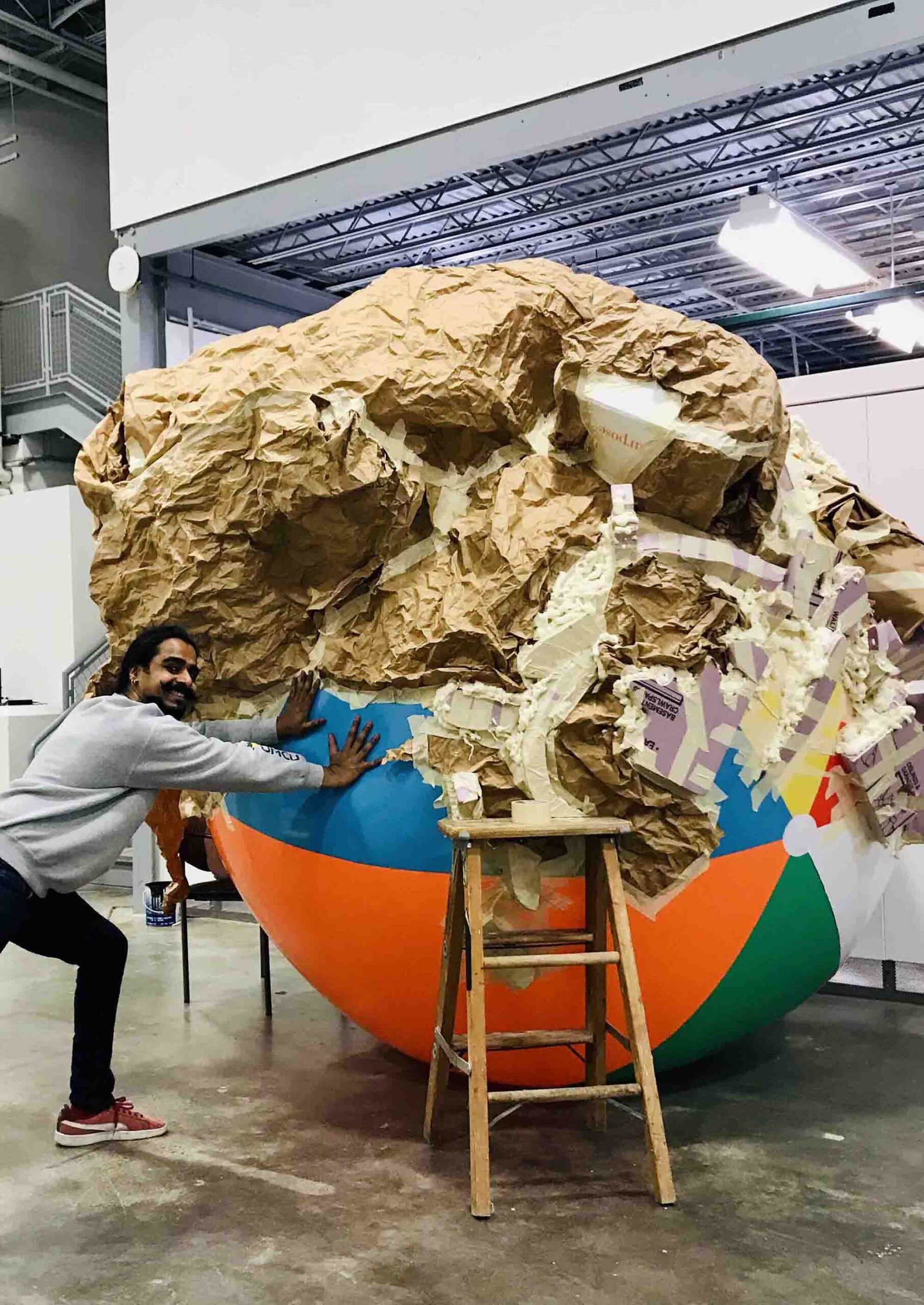 artist building breathing boulder sculpture
